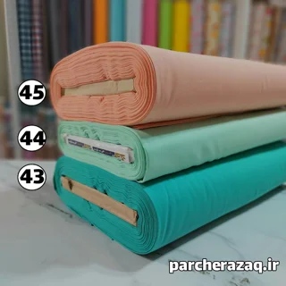 پارچه تترون ساده هلویی، سبز بنتون و سیب کالی عرض 90 سانتی متر